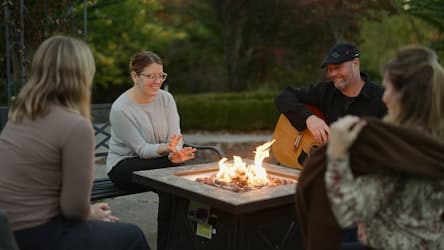 music by a fire pit at pasadena villa smoky mountain lodge